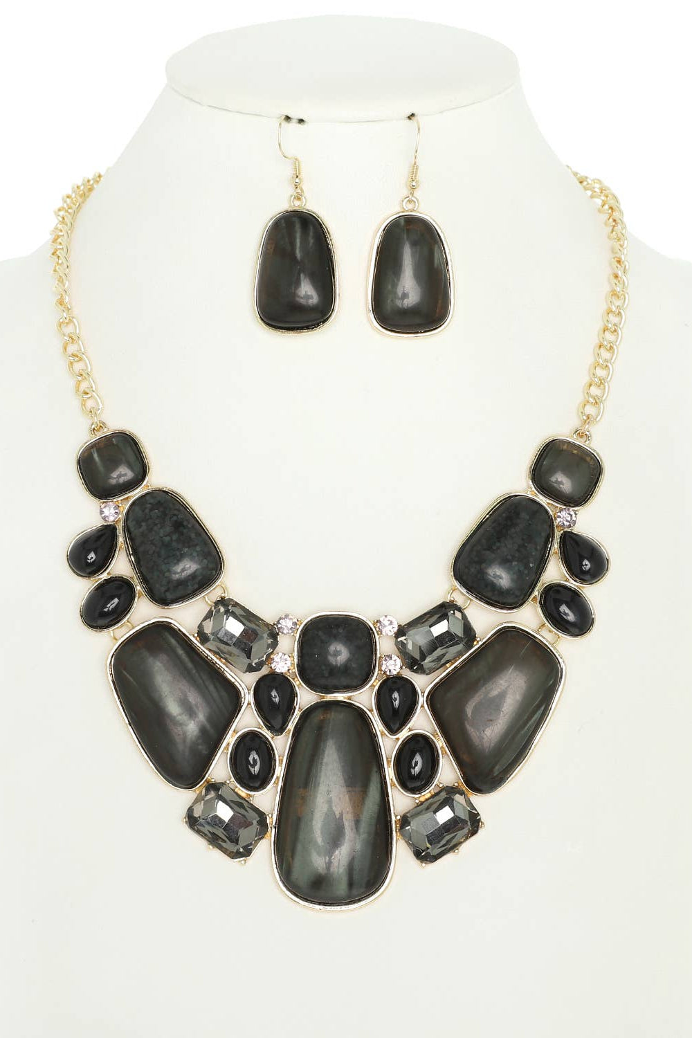 Black stone necklace and earrings set on a mannequin with a white background Born To Glam