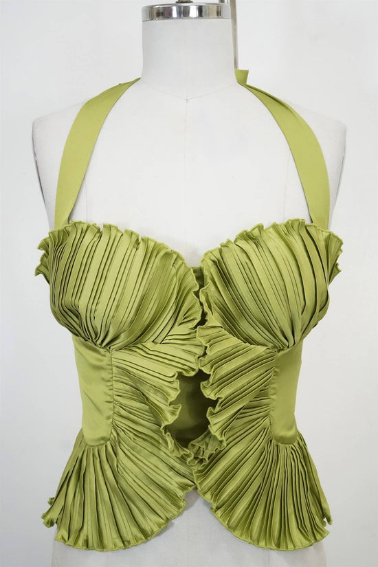 Green pleated top on a mannequin against a white background Born To Glam