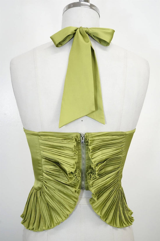 Green halter top with ruched design on a mannequin against a white background Born To Glam