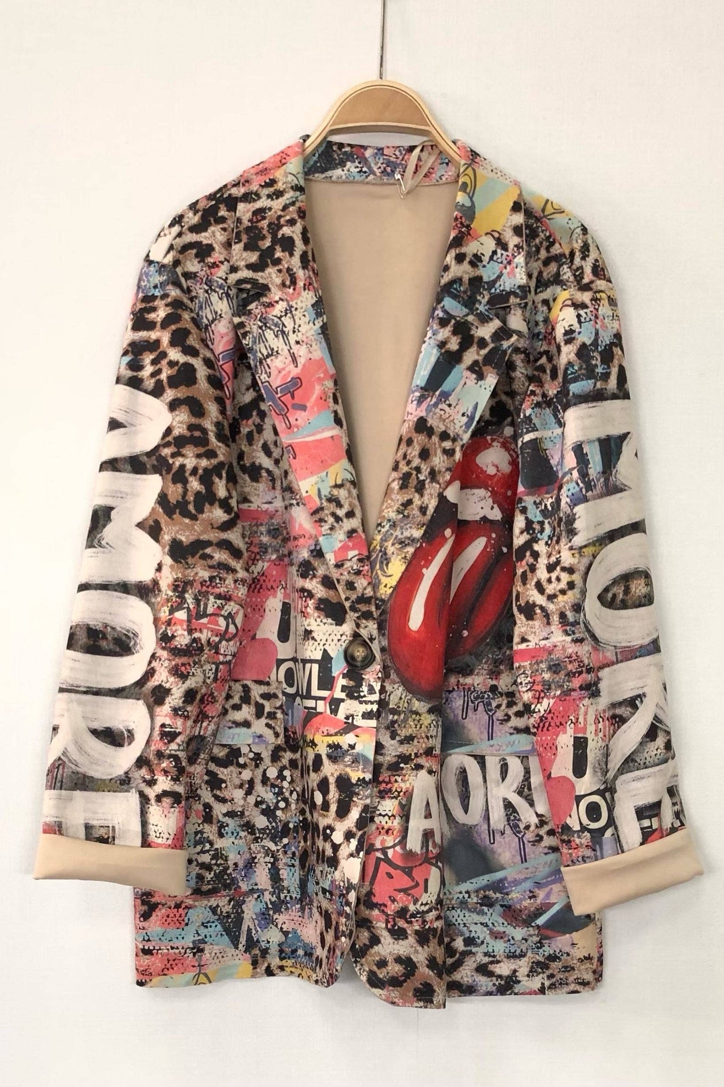 Two patterned jackets with graphic designs on a white background Born To Glam