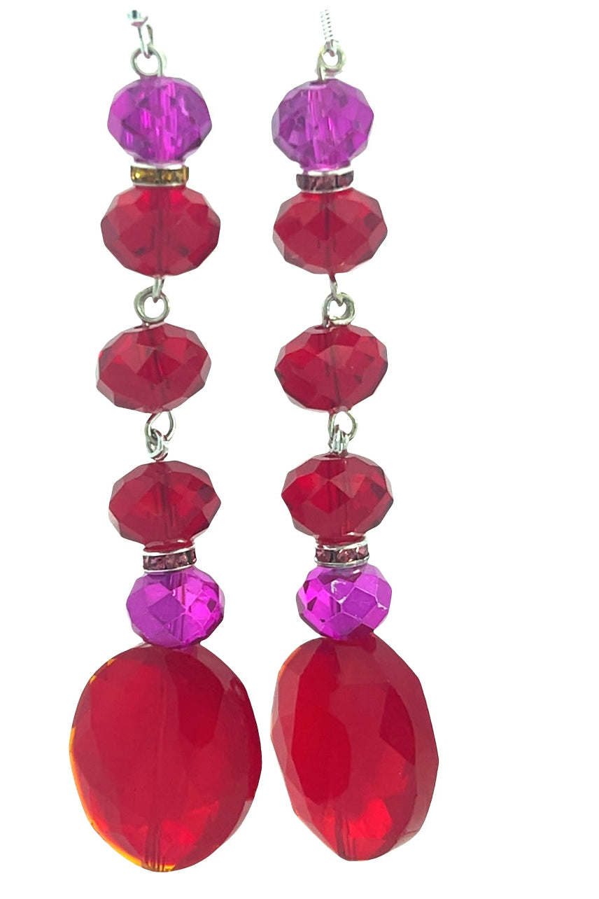 Pair of earrings with pink and red beads on a white background Born To Glam