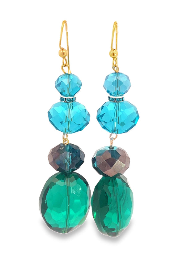 Pair of earrings with blue and green faceted beads on a white background Born To Glam