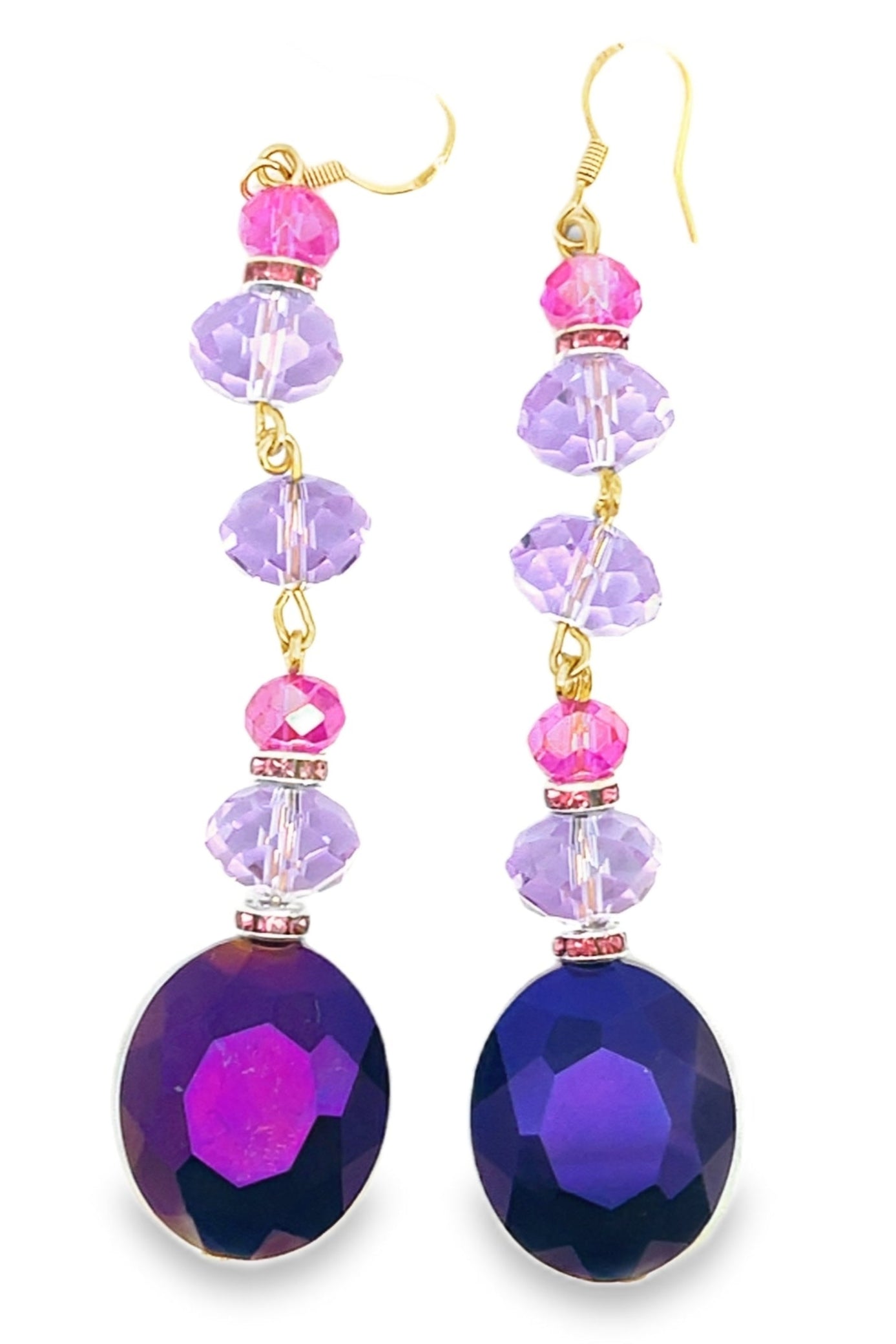 Pair of earrings with purple and pink beads on a white background Born To Glam
