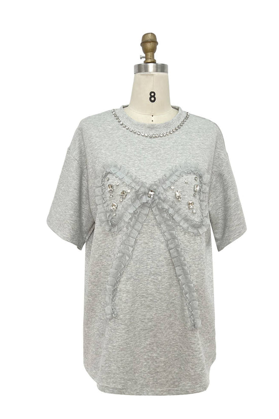 Gray sweater with embellishments on a mannequin against a white background Born To Glam