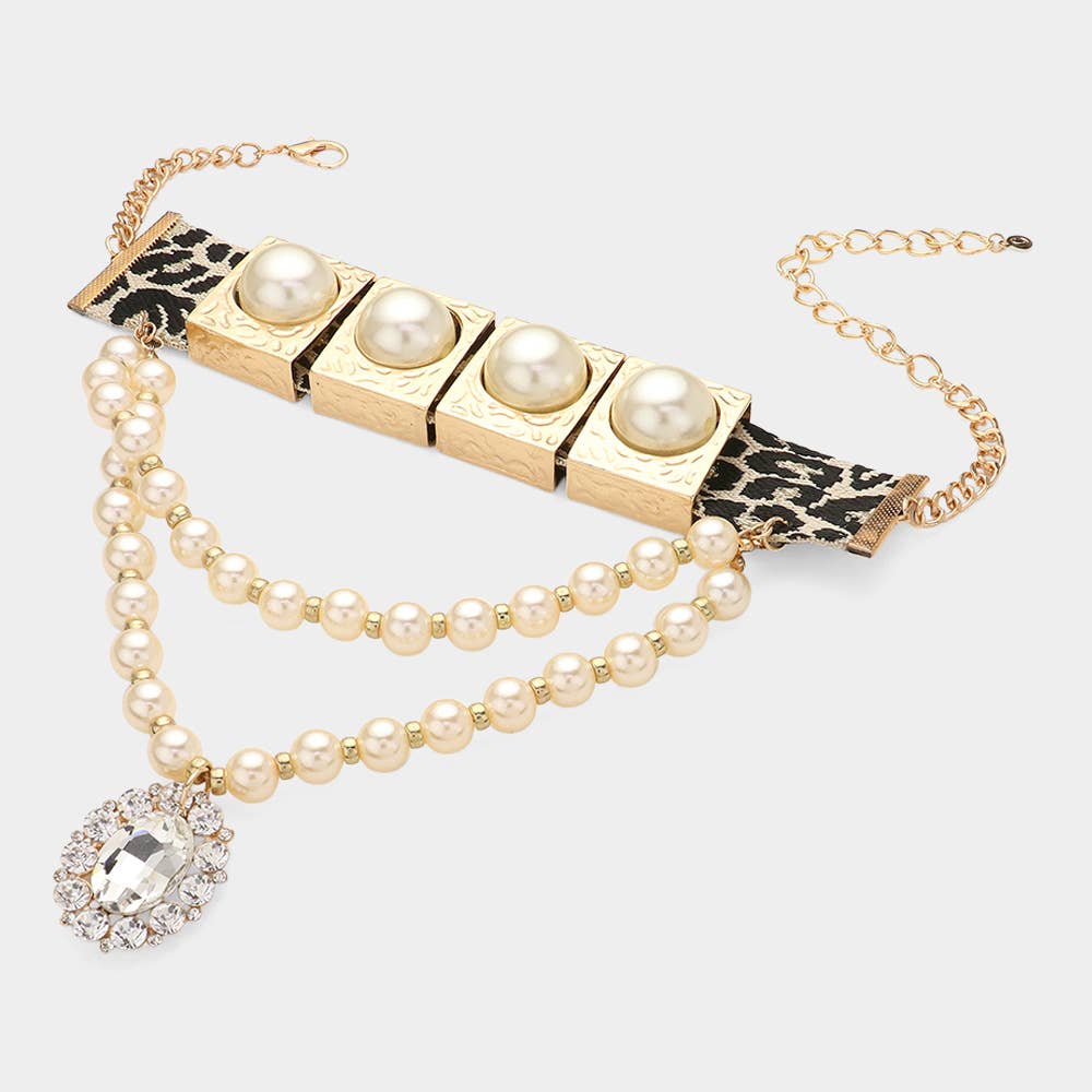 Necklace with pearl beads and leopard print accents on a white background Born To Glam