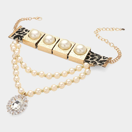 Necklace with pearl beads and leopard print accents on a white background Born To Glam