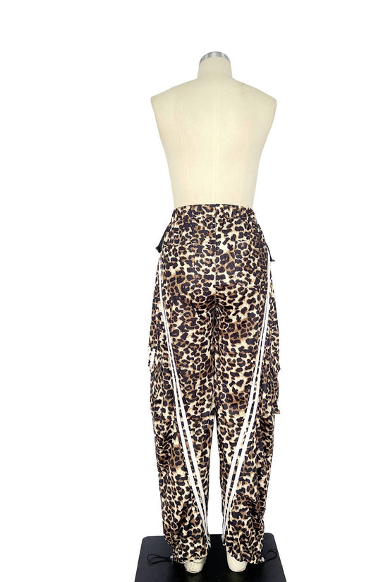 Leopard print pants on a mannequin against a white background Born To Glam