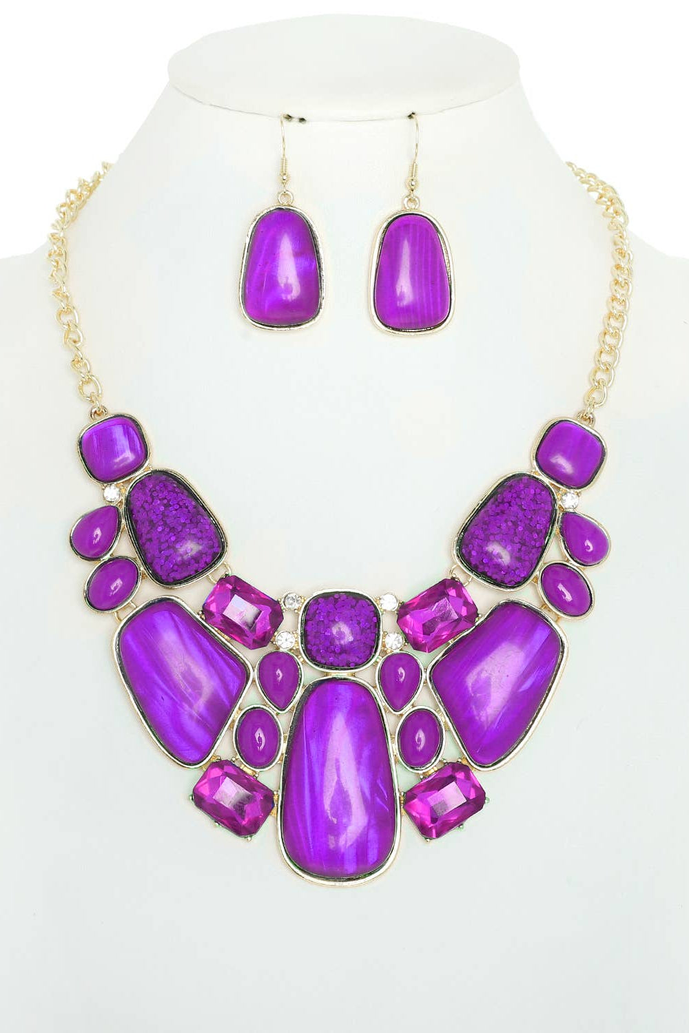 Purple necklace and earrings set on a mannequin with a white background Born To Glam
